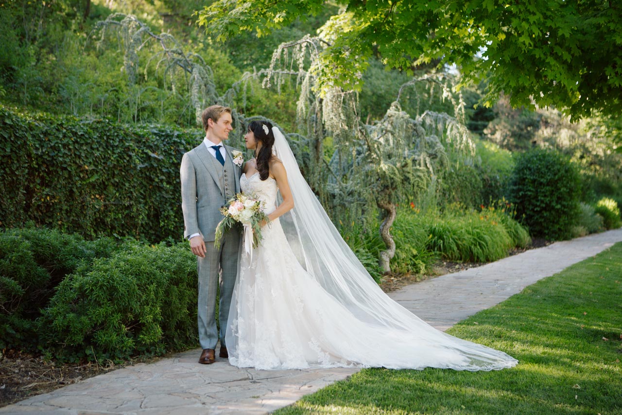 Wedding couple in lush gardens at Memory Grove.