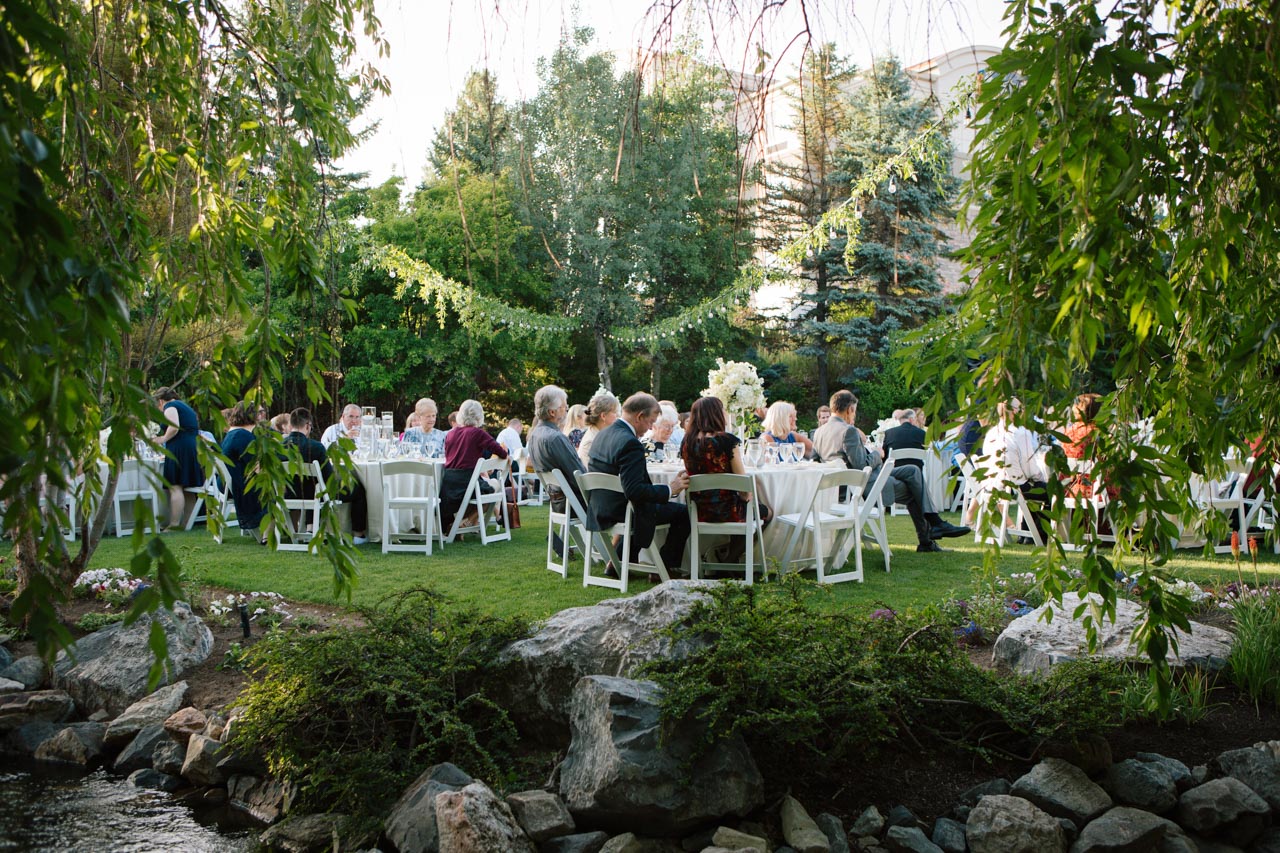 Wedding guests enjoy a reception at Hidden Falls.