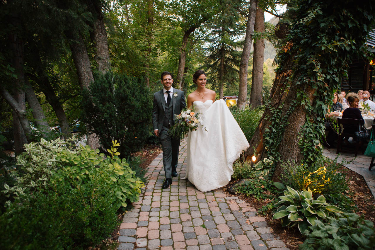 The wedding couple enters their reception at Millcreek Inn.